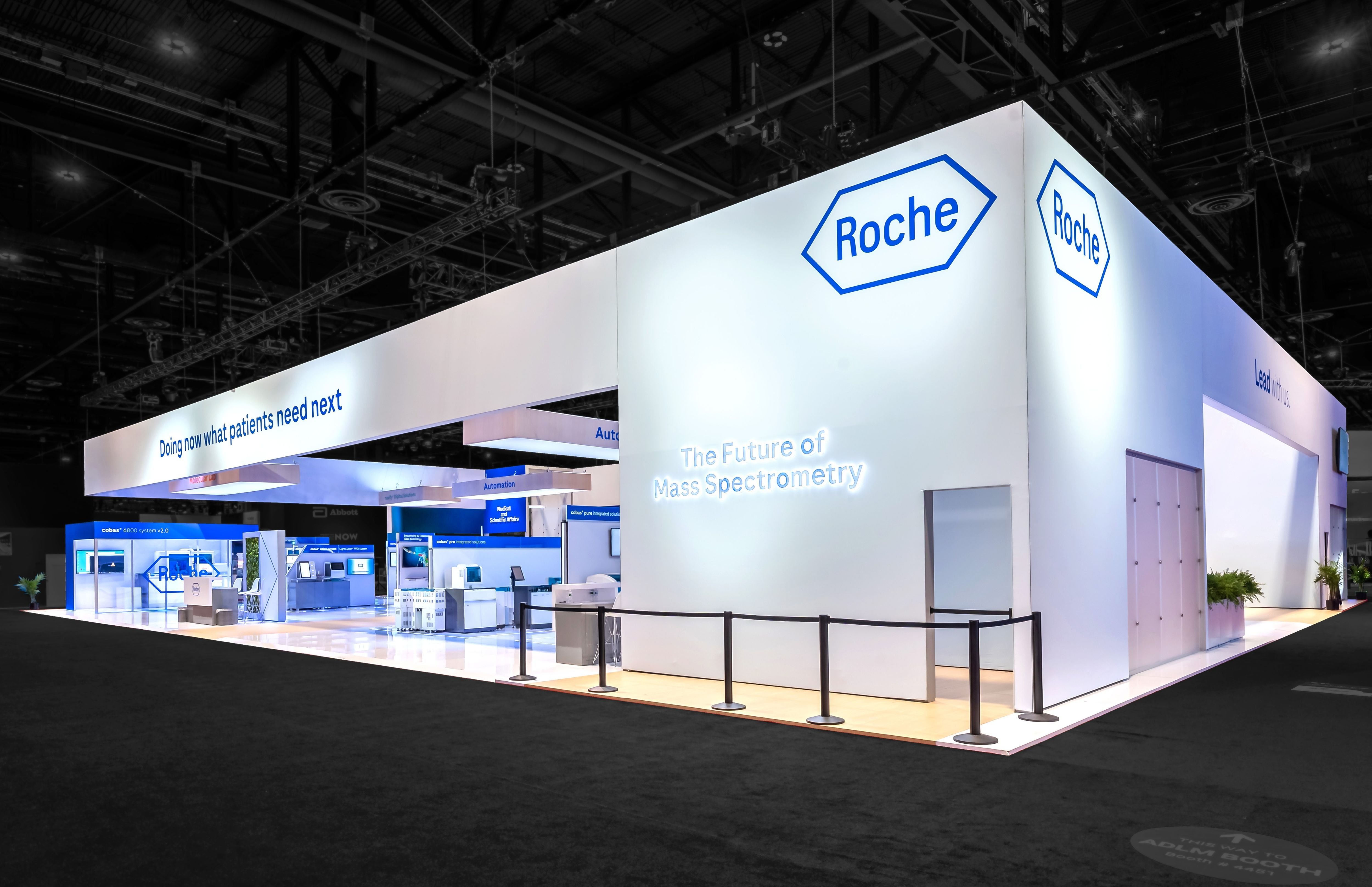Large scale HIMSS trade show exhibit featuring integrated medical machinery